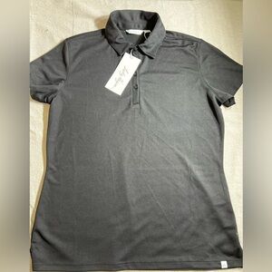 Lady‎ Hagen size M. Black polo. 100% polyester. NWT. Retails for $50.00